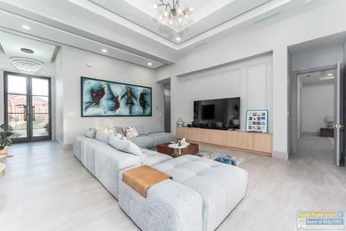 Stunning modern home built in 2022, located in the SPI golf on South Padre Island Golf Club in Texas - for sale on GolfHomes.com, golf home, golf lot