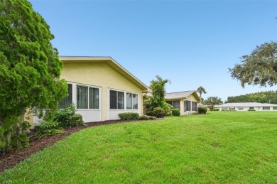Enjoy effortless Florida living in this fully furnished on Falcon Watch Golf Club in Florida - for sale on GolfHomes.com, golf home, golf lot