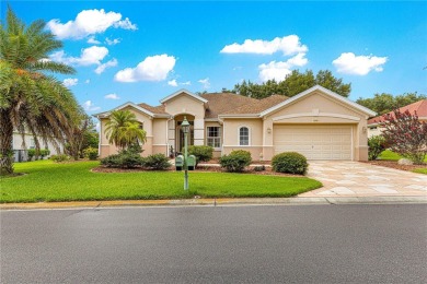 Golf Course location with panoramic views to a tree lined area on Eagle Ridge At Spruce Creek Country Club in Florida - for sale on GolfHomes.com, golf home, golf lot