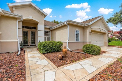 Golf Course location with panoramic views to a tree lined area on Eagle Ridge At Spruce Creek Country Club in Florida - for sale on GolfHomes.com, golf home, golf lot