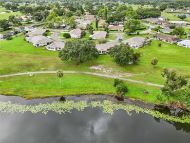 Enjoy effortless Florida living in this fully furnished on Falcon Watch Golf Club in Florida - for sale on GolfHomes.com, golf home, golf lot