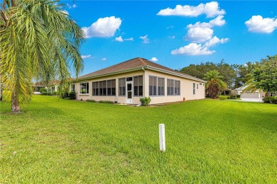 Golf Course location with panoramic views to a tree lined area on Eagle Ridge At Spruce Creek Country Club in Florida - for sale on GolfHomes.com, golf home, golf lot