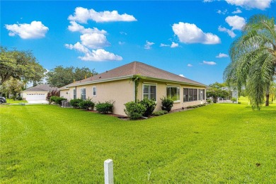 Golf Course location with panoramic views to a tree lined area on Eagle Ridge At Spruce Creek Country Club in Florida - for sale on GolfHomes.com, golf home, golf lot