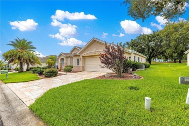 Golf Course location with panoramic views to a tree lined area on Eagle Ridge At Spruce Creek Country Club in Florida - for sale on GolfHomes.com, golf home, golf lot