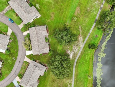 Enjoy effortless Florida living in this fully furnished on Falcon Watch Golf Club in Florida - for sale on GolfHomes.com, golf home, golf lot