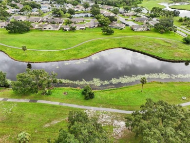 Enjoy effortless Florida living in this fully furnished on Falcon Watch Golf Club in Florida - for sale on GolfHomes.com, golf home, golf lot