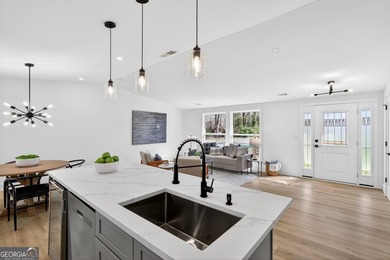 OPEN HOUSE SAT 3/7 FROM 12-2PM!! COMPLETELY REIMAGINED FROM THE on Canongate At Flat Creek Club in Georgia - for sale on GolfHomes.com, golf home, golf lot