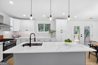 OPEN HOUSE SAT 3/7 FROM 12-2PM!! COMPLETELY REIMAGINED FROM THE on Canongate At Flat Creek Club in Georgia - for sale on GolfHomes.com, golf home, golf lot