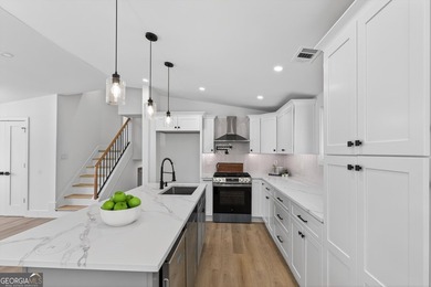 OPEN HOUSE SAT 3/7 FROM 12-2PM!! COMPLETELY REIMAGINED FROM THE on Canongate At Flat Creek Club in Georgia - for sale on GolfHomes.com, golf home, golf lot