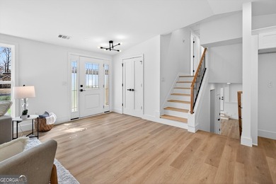 OPEN HOUSE SAT 3/7 FROM 12-2PM!! COMPLETELY REIMAGINED FROM THE on Canongate At Flat Creek Club in Georgia - for sale on GolfHomes.com, golf home, golf lot