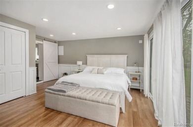 Fall in love with lake living! Just a short walk to Lake Erie on Lake Erie Metropark Golf Course in Michigan - for sale on GolfHomes.com, golf home, golf lot