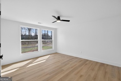 OPEN HOUSE SAT 3/7 FROM 12-2PM!! COMPLETELY REIMAGINED FROM THE on Canongate At Flat Creek Club in Georgia - for sale on GolfHomes.com, golf home, golf lot