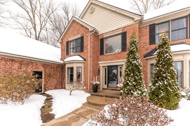 Custom-built 4-bedroom colonial set on a gorgeous 1-acre wooded on Stonebridge Golf Club in Michigan - for sale on GolfHomes.com, golf home, golf lot