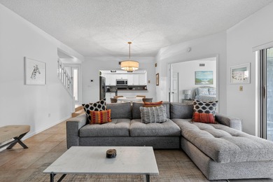 2 bedroom / 2.5 bath w/ primary bedroom on main floor. This home on Jupiter Dunes Golf Course in Florida - for sale on GolfHomes.com, golf home, golf lot