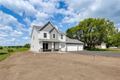 Situated just off of the 16th green of The Vintage Golf Course on Vintage Golf Course in Minnesota - for sale on GolfHomes.com, golf home, golf lot