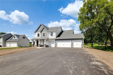 Situated just off of the 16th green of The Vintage Golf Course on Vintage Golf Course in Minnesota - for sale on GolfHomes.com, golf home, golf lot