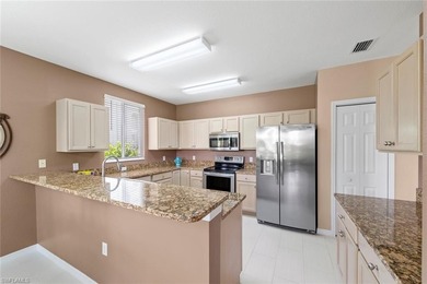 Experience effortless country club living in this beautifully on Estero Country Club in Florida - for sale on GolfHomes.com, golf home, golf lot