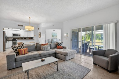 2 bedroom / 2.5 bath w/ primary bedroom on main floor. This home on Jupiter Dunes Golf Course in Florida - for sale on GolfHomes.com, golf home, golf lot