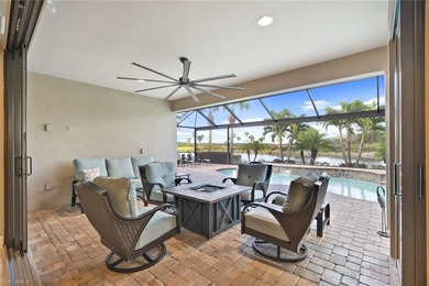 This home HAS IT ALL - GOLF MEMBERSHIP, BREATHTAKING WATER & on Panther Run Golf Club in Florida - for sale on GolfHomes.com, golf home, golf lot