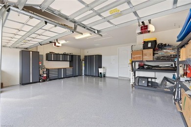 This home HAS IT ALL - GOLF MEMBERSHIP, BREATHTAKING WATER & on Panther Run Golf Club in Florida - for sale on GolfHomes.com, golf home, golf lot