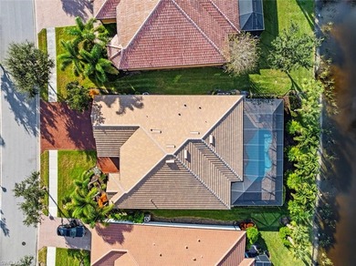 This home HAS IT ALL - GOLF MEMBERSHIP, BREATHTAKING WATER & on Panther Run Golf Club in Florida - for sale on GolfHomes.com, golf home, golf lot