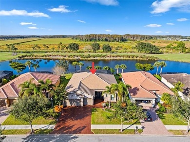 This home HAS IT ALL - GOLF MEMBERSHIP, BREATHTAKING WATER & on Panther Run Golf Club in Florida - for sale on GolfHomes.com, golf home, golf lot