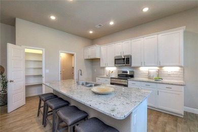 This affordable new home can be your first step to investing in on Heritage Park Golf Course in Kansas - for sale on GolfHomes.com, golf home, golf lot