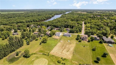 Situated just off of the 16th green of The Vintage Golf Course on Vintage Golf Course in Minnesota - for sale on GolfHomes.com, golf home, golf lot