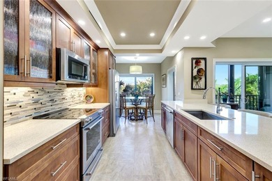 A custom design like no other! This three bedroom 2 bath condo on Club at Pelican Bay Golf Course in Florida - for sale on GolfHomes.com, golf home, golf lot