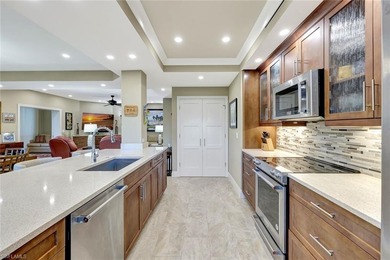 A custom design like no other! This three bedroom 2 bath condo on Club at Pelican Bay Golf Course in Florida - for sale on GolfHomes.com, golf home, golf lot