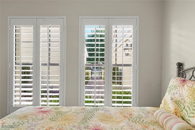 Nestled in the intimate Carriedale Cottages of Fiddlesticks on  in Florida - for sale on GolfHomes.com, golf home, golf lot