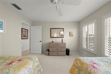 Nestled in the intimate Carriedale Cottages of Fiddlesticks on  in Florida - for sale on GolfHomes.com, golf home, golf lot