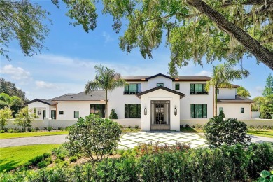 Exceptional in both style and scale, this extraordinary on Isleworth Golf and Country Club in Florida - for sale on GolfHomes.com, golf home, golf lot