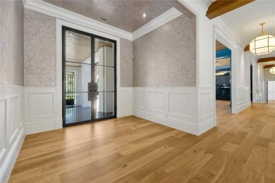 Exceptional in both style and scale, this extraordinary on Isleworth Golf and Country Club in Florida - for sale on GolfHomes.com, golf home, golf lot