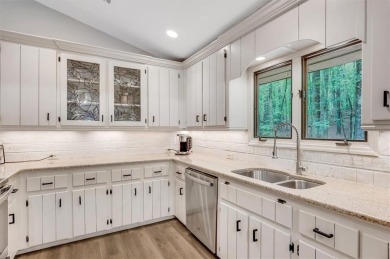 Perched above the shoreline on nearly half an acre, this turnkey on The Highlands Course at Lake Arrowhead in Georgia - for sale on GolfHomes.com, golf home, golf lot