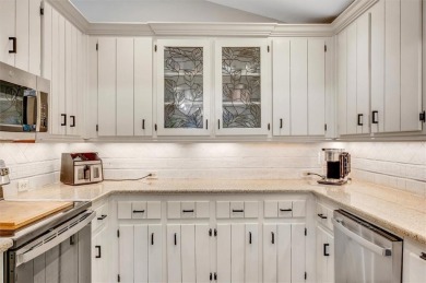 Perched above the shoreline on nearly half an acre, this turnkey on The Highlands Course at Lake Arrowhead in Georgia - for sale on GolfHomes.com, golf home, golf lot