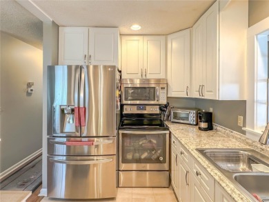 Located close to the North Club, this charming condo has been on Kings Point Executive Golf Course in Florida - for sale on GolfHomes.com, golf home, golf lot