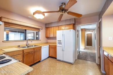 Welcome to this beautifully maintained 3-bedroom, 2-bath home on Continental Country Club in Arizona - for sale on GolfHomes.com, golf home, golf lot