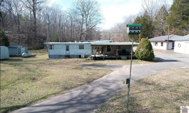 Kenlake Trailer Park Boyd's Cove. This is a business opportunity on Kenlake Par-3 State Resort Park Golf Course in Kentucky - for sale on GolfHomes.com, golf home, golf lot