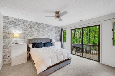 Perched above the shoreline on nearly half an acre, this turnkey on The Highlands Course at Lake Arrowhead in Georgia - for sale on GolfHomes.com, golf home, golf lot