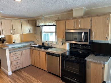 Park East is an age 55+ Resident Owned Cooperative (Co-op) on Polo Park East in Florida - for sale on GolfHomes.com, golf home, golf lot