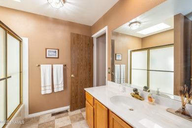 Welcome to this beautifully maintained 3-bedroom, 2-bath home on Continental Country Club in Arizona - for sale on GolfHomes.com, golf home, golf lot