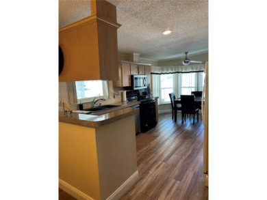 Park East is an age 55+ Resident Owned Cooperative (Co-op) on Polo Park East in Florida - for sale on GolfHomes.com, golf home, golf lot