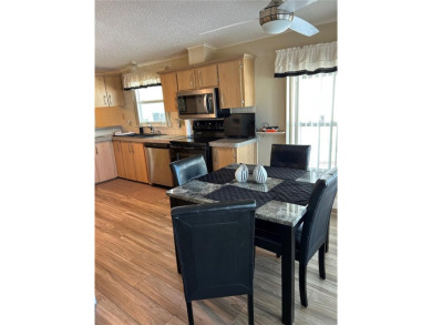 Park East is an age 55+ Resident Owned Cooperative (Co-op) on Polo Park East in Florida - for sale on GolfHomes.com, golf home, golf lot