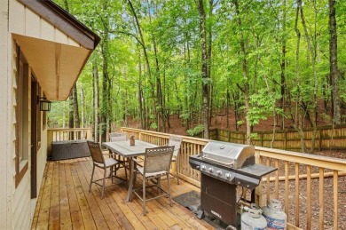 Perched above the shoreline on nearly half an acre, this turnkey on The Highlands Course at Lake Arrowhead in Georgia - for sale on GolfHomes.com, golf home, golf lot
