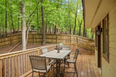 Perched above the shoreline on nearly half an acre, this turnkey on The Highlands Course at Lake Arrowhead in Georgia - for sale on GolfHomes.com, golf home, golf lot