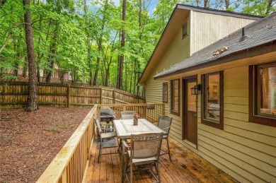 Perched above the shoreline on nearly half an acre, this turnkey on The Highlands Course at Lake Arrowhead in Georgia - for sale on GolfHomes.com, golf home, golf lot
