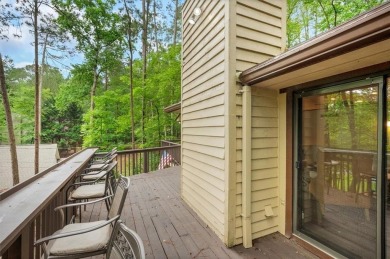 Perched above the shoreline on nearly half an acre, this turnkey on The Highlands Course at Lake Arrowhead in Georgia - for sale on GolfHomes.com, golf home, golf lot