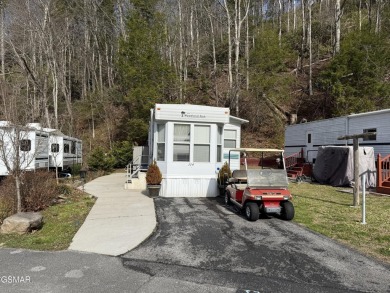 Large RV lot with gorgeous landscaping.  The lot backs up to the on Bent Creek Golf Course in Tennessee - for sale on GolfHomes.com, golf home, golf lot