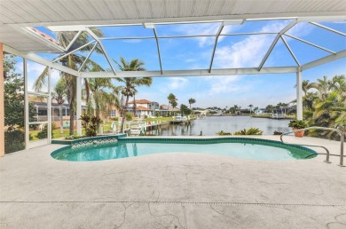 WATERFRONT pool home located in desirable deed restricted BURNT on Twin Isles Country Club in Florida - for sale on GolfHomes.com, golf home, golf lot